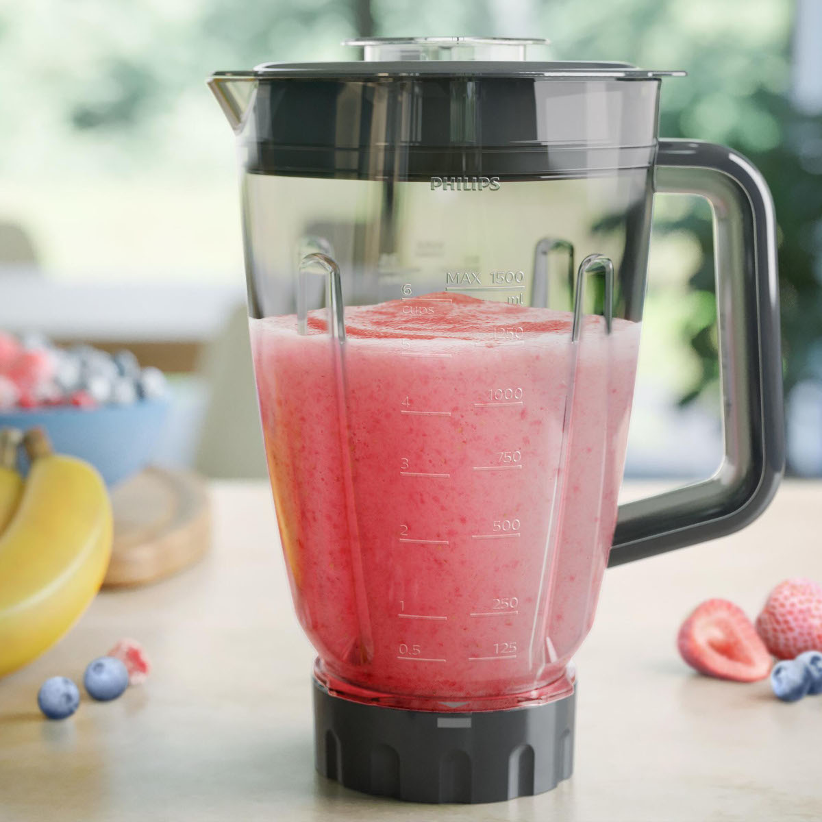 Blender kielichowy Philips HR3020/20 1000W widok na kielich od boku wypełniony koktajlem