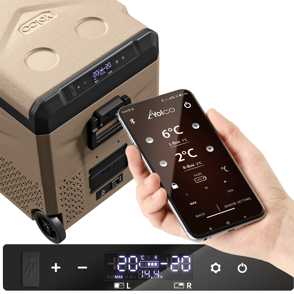 Lodówka przenośna Yolco TCX50 50 l pod skosem i telefon z włączoną aplikacją trzymany w dłoni