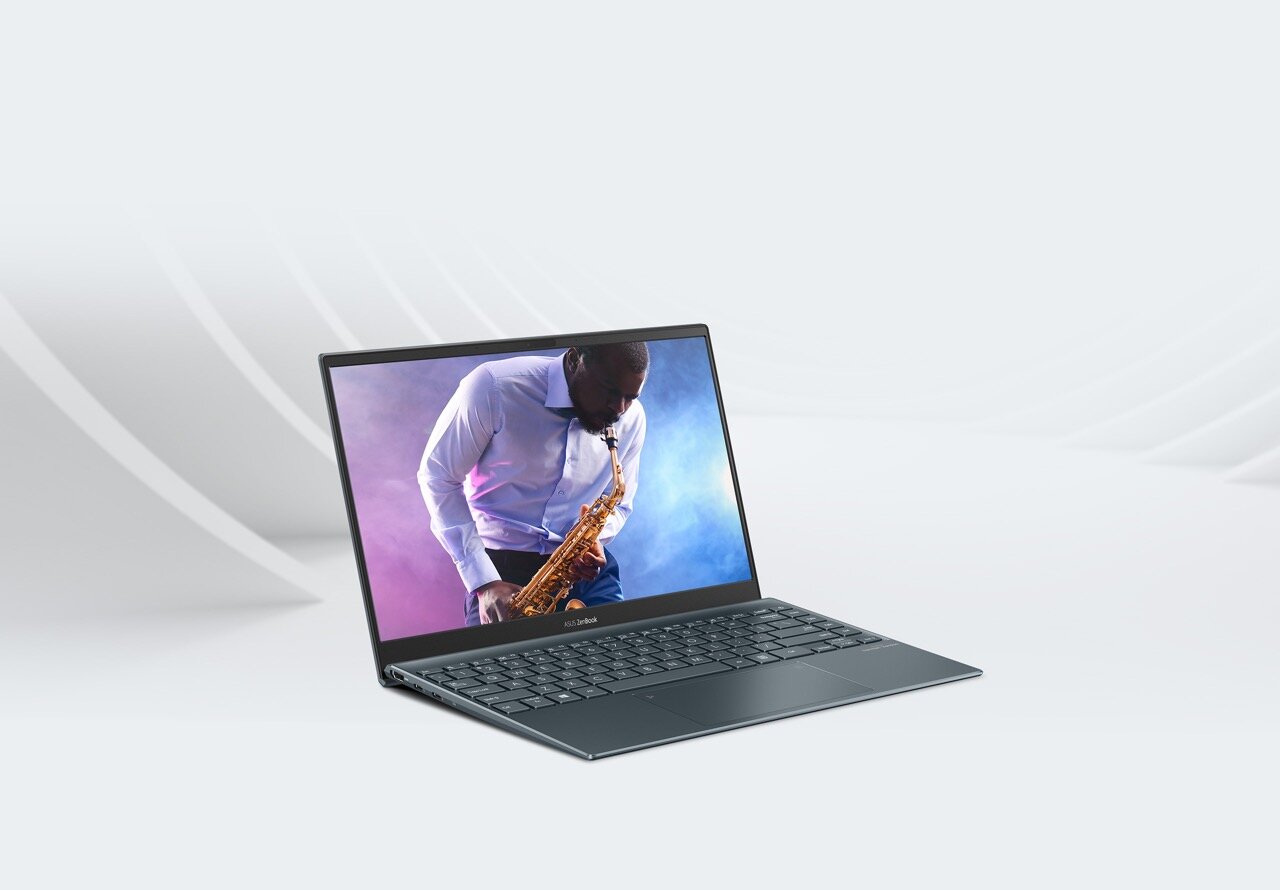 laptop ASUS ZenBook 14 szary widok od boku wizualizacja fal dźwiękowych