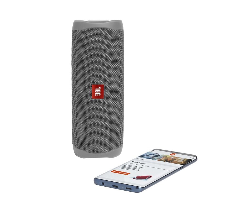 Głośnik JBL Flip 5 obok telefonu