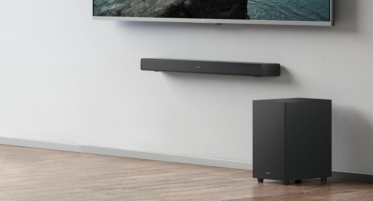 Soundbar Xiaomi 3.1ch 430W pokazany soundbar zamocowany na ścianie