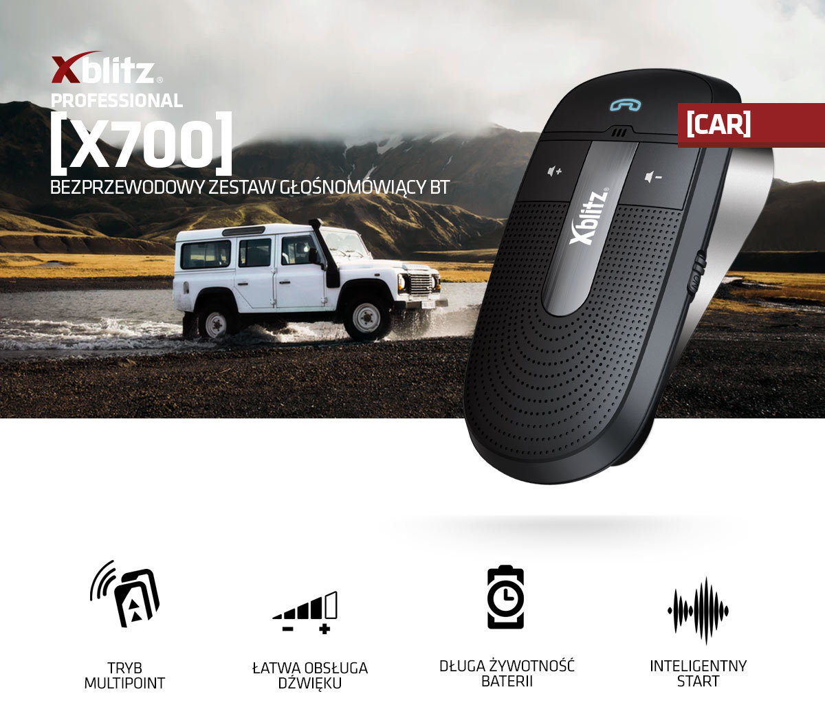 Zestaw głośnomowiący do samochodu Xblitz x700 Bluetooth na tle białego samochodu w górach