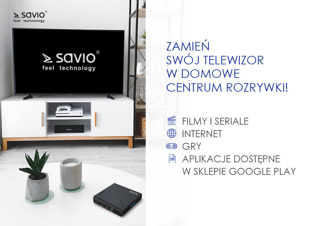 Odtwarzacz multimedialny Savio Smart TV Box Platinum TB-P02 urządzenie na stole na tle telewizora
