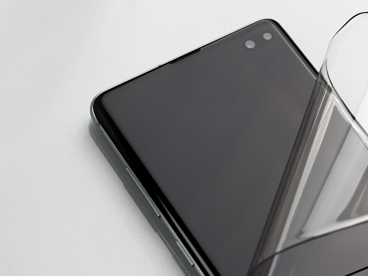 Szkło Hybrydowe 3D 3MK FlexibleGlass Edge do Samsung Galaxy S20 widok od góry na smartfon z przykładanym do ekranu szkłem