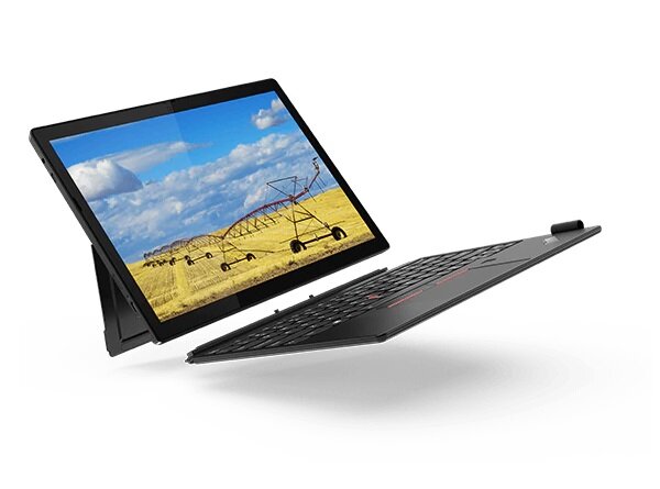 Tablet Lenovo ThinkPad X12 Detachable 20UW000EPB widok na tablet z klawiaturą pod nim pod skosem