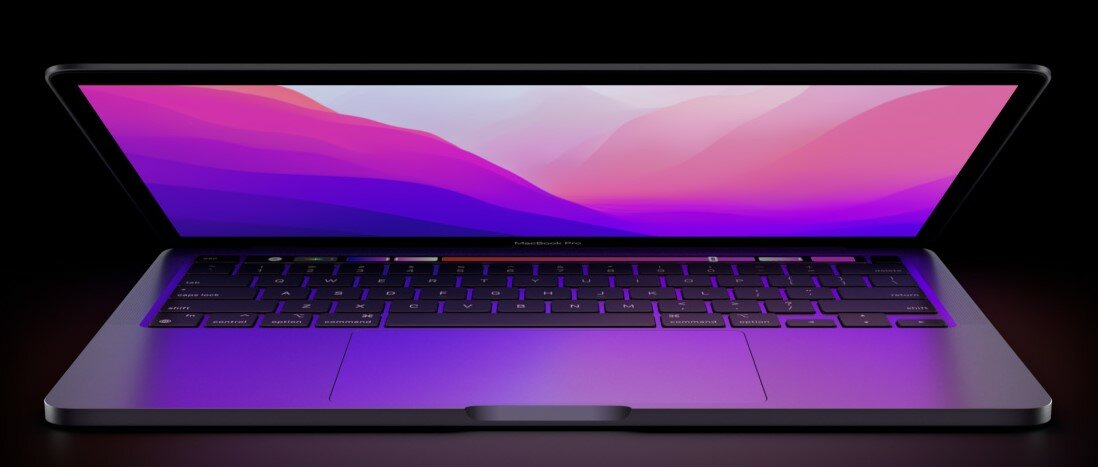 Laptop Apple MacBook Pro MYDA2ZE/A/R1 16/256GB podświetlony fioletowym światłem będąc frontem