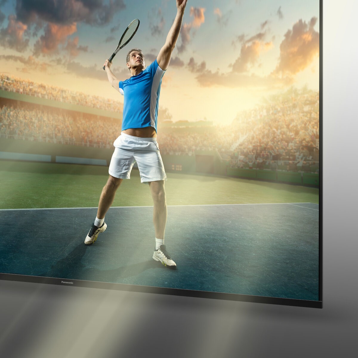 TV Panasonic TX-58JX800E widok na front urządzenia z tenisistą na ekranie