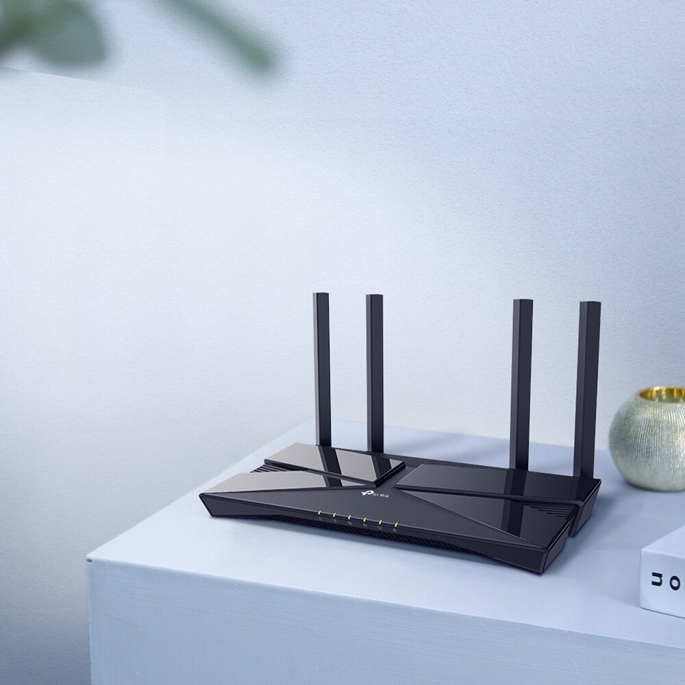 Router TP-Link Archer AX23 router na szafce
