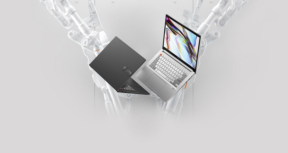 Laptop Asus Vivobook Pro 14X OLED N7400PC-KM012R widok na otwartego laptopa oraz na klapę przymkniętego laptopa pod skosem