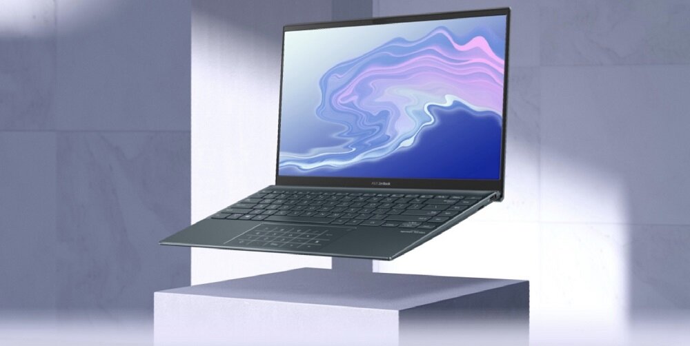Laptop Asus ZenBook 14 UM425 UM425UA-KI219T pod skosem w lewo