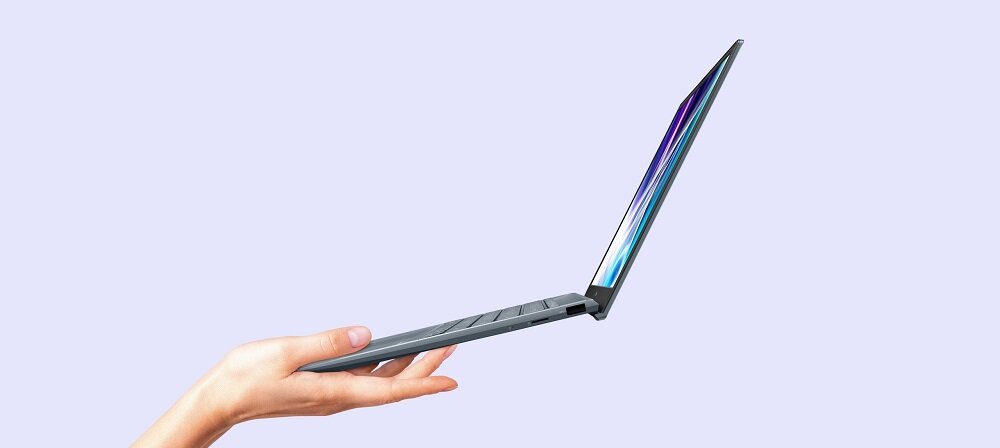 Laptop Asus ZenBook 14 UM425 UM425QA-KI011T widok na laptopa od boku