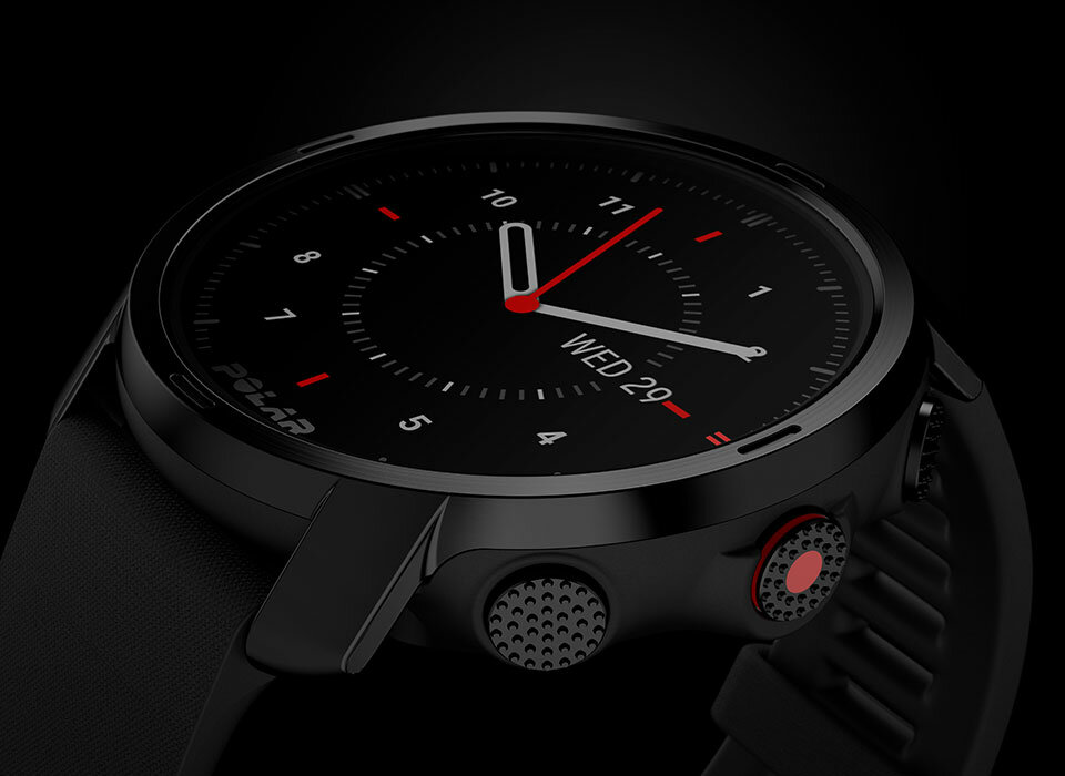 Smartwatch Polar GRIT X czarny M/L para zbliżenie na tarczę zegarka, lekko bokiem