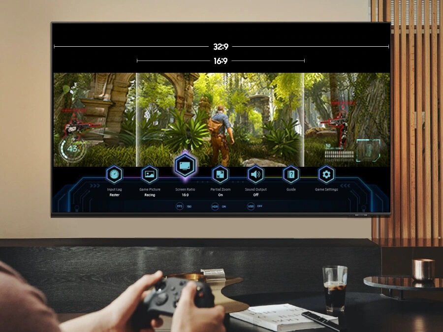 Telewizor Samsung QE75Q67BAUXXH od frontu z włączoną na ekranie grą