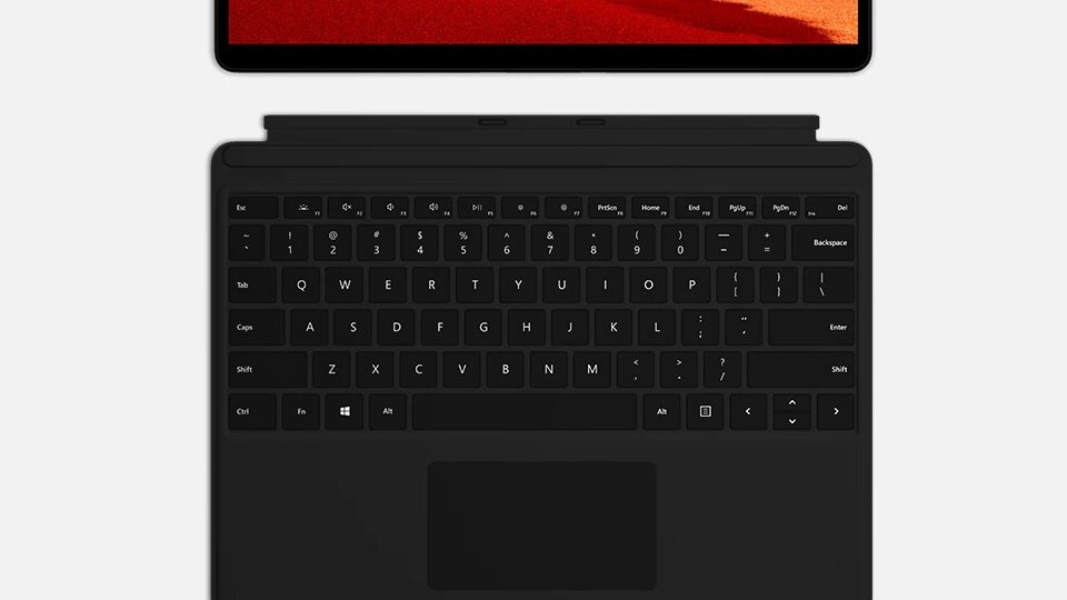 Klawiatura Microsoft Type Cover do Surface Pro X, Pro 8 na białym tle obok notebooka