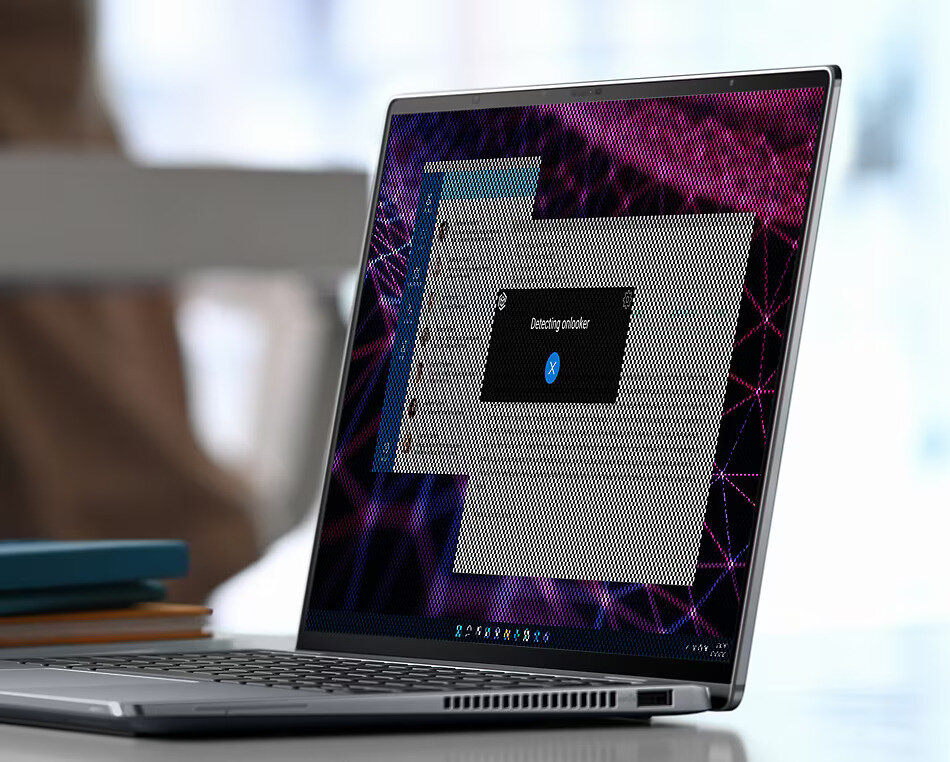 Laptop Dell Latitude 9430 i7-1265U 16/512GB grafika przedstawia laptop pod skosem, z nałożoną na ekran teksturą chroniącą prywatność