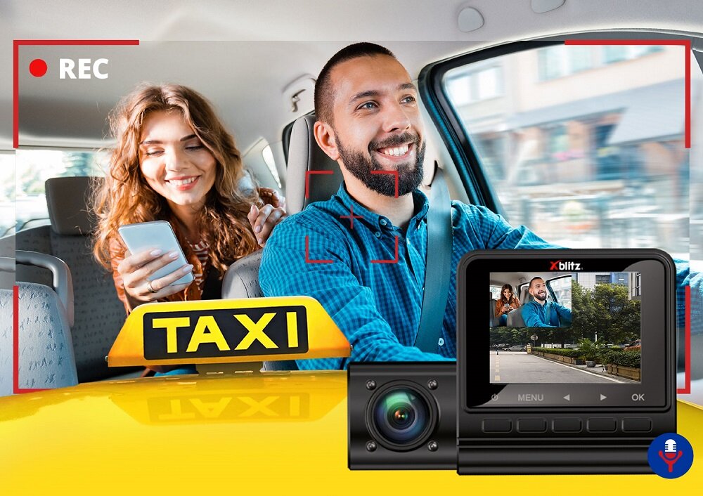 Wideorejestrator Xblitz Dual View widok na wideorejestrator od frontu na tle kobiety i mężczyzny w taksówce