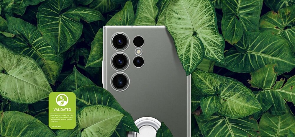Etui Samsung Clear Gadget Case EF-XS911CTEGWW widok na tylny aparat telefonu leżącego pomiędzy liściami