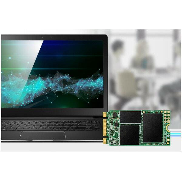 Dysk Transcend 430S M.2 SSD zdjęcie dysku obok laptopa