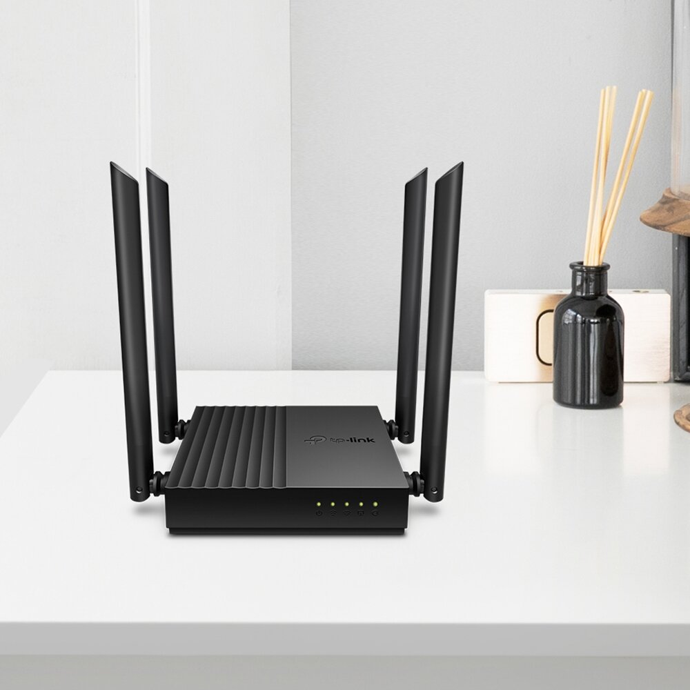 Router TP-Link Archer A64 czarny routera na szafce