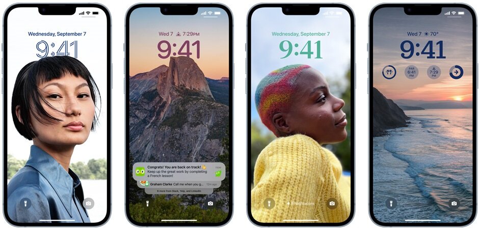 Smartfon Apple iPhone 14 MR3X3PX/A widok na cztery smartfony od frontu z ustawionymi różnymi zdjęciami na ekranie blokady