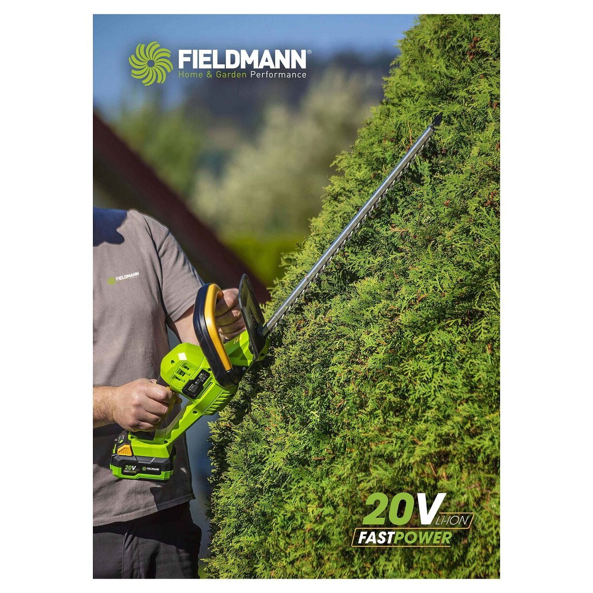 Nożyce akumulatorowe Fieldmann FZN 70205-0 podczas przycinania żywopłotu