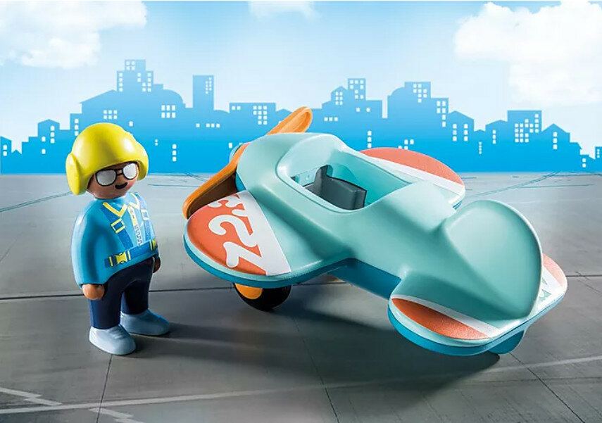  Zabawka Playmobil samolot z obrotowym śmigłem i pilotem po lewej samolot po prawej stronie