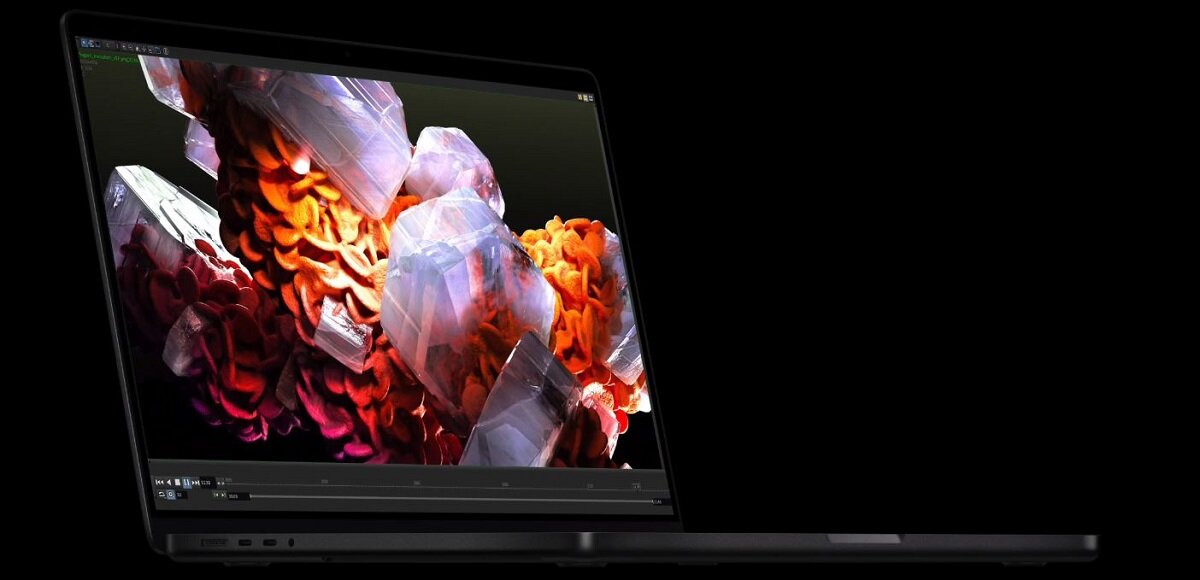 Laptop Apple MacBook Pro 14 M3 512 GB srebrny widok pod skosem na laptopa z włączonym ekranem