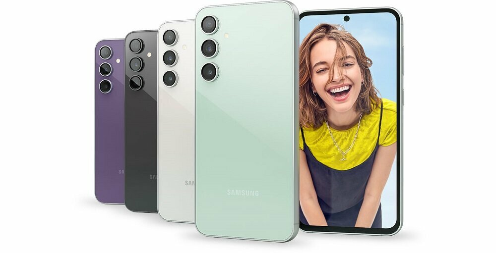 Smartfon Samsung Galaxy S23 FE SM-S711 8GB/256GB kremowy widok na ekran smartfona pod skosem oraz cztery smartfony od tyłu pod skosem